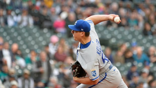 Apr 22, 2022; Seattle, Washington, USA; Kansas City Royals starting pitcher Brad Keller (56) pitches to the Seattle Mariners during the first inning at T-Mobile Park. Mandatory Credit: Steven Bisig-USA TODAY Sports